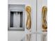 Thermador refrigerator with stainless steel accents and unique decorative door handles at 151 Brailsford St, Charleston, SC 29492