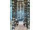 The wine cellar has a glass door that allows you to view the wall-to-wall wine racks inside at 151 Brailsford St, Charleston, SC 29492