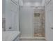 Modern bathroom featuring a glass door shower, decorative niche, and stylish tile work at 1860 Pinopolis Rd, Pinopolis, SC 29469