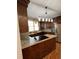 Gourmet kitchen with granite countertops, stainless steel appliances, and custom wood cabinetry at 1860 Pinopolis Rd, Pinopolis, SC 29469