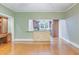 Spacious living room with a breakfast bar looking into a well-equipped kitchen at 1860 Pinopolis Rd, Pinopolis, SC 29469