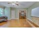 Comfortable living area with built-in shelving and a cozy seating area near the window at 1860 Pinopolis Rd, Pinopolis, SC 29469