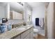 Bathroom featuring granite countertops, modern fixtures, and updated shower at 204 E Edgefield Dr, Summerville, SC 29483