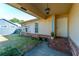 Welcoming covered front porch with brick steps and a view of the front yard at 204 E Edgefield Dr, Summerville, SC 29483