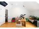 Attic space with a desk, an aquarium, and a sloped ceiling, offering unique potential at 22 1/2 Mary St # A B C, Charleston, SC 29403