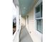 Covered balcony area with recessed lighting and ample space at 22 1/2 Mary St # A B C, Charleston, SC 29403