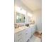 Elegant bathroom features double vanity with marble countertop and modern fixtures at 22 1/2 Mary St # A B C, Charleston, SC 29403