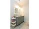 Bathroom with a double sink vanity, sleek fixtures, and marble countertop, offering both style and functionality at 22 1/2 Mary St # A B C, Charleston, SC 29403
