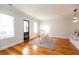 Dining room adjacent to kitchen with hardwood flooring and natural light at 22 1/2 Mary St # A B C, Charleston, SC 29403