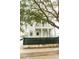 Charming home boasts a double porch, classic architectural details, and shade tree at 22 1/2 Mary St # A B C, Charleston, SC 29403