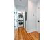 Efficient laundry area with stacked washer/dryer unit and neutral wall color at 22 1/2 Mary St # A B C, Charleston, SC 29403