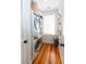 Convenient laundry room with stacked washer and dryer, plus built in storage at 22 1/2 Mary St # A B C, Charleston, SC 29403