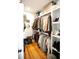 Spacious walk-in closet with custom shelving and ample storage space for clothes, shoes, and accessories at 22 1/2 Mary St # A B C, Charleston, SC 29403