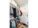 Walk-in closet with neatly arranged clothing and shoe racks for optimal storage at 22 1/2 Mary St # A B C, Charleston, SC 29403