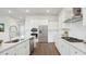 Contemporary kitchen featuring stainless steel appliances, a gas range, an island, and ample cabinet space at 230 Denham St, Summerville, SC 29486