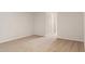 Neutral bedroom with carpeting and a door to an adjacent room at 287 Blue Haw Dr, Moncks Corner, SC 29461