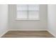 Bedroom with window and faux wood floors at 287 Blue Haw Dr, Moncks Corner, SC 29461