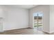 Dining area with sliding glass doors, view, white walls, and wood-look flooring at 287 Blue Haw Dr, Moncks Corner, SC 29461