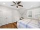 Bedroom features hardwood floors, ceiling fan, and large closet at 2932 Old Drake Dr, Seabrook Island, SC 29455