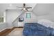 Comfortable bedroom features a ceiling fan, natural light, and a view of the outside at 2932 Old Drake Dr, Seabrook Island, SC 29455