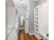 Walk-in closet with custom shelving, drawers, and ample storage space at 2932 Old Drake Dr, Seabrook Island, SC 29455