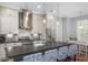 Modern kitchen with stainless steel appliances, granite countertops, and a stylish island with seating at 2932 Old Drake Dr, Seabrook Island, SC 29455