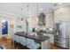 Modern kitchen with stainless steel appliances and a large island at 2932 Old Drake Dr, Seabrook Island, SC 29455
