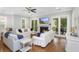 Inviting living room with a fireplace and porch access at 2932 Old Drake Dr, Seabrook Island, SC 29455