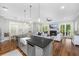Open kitchen and living room with a view of the backyard at 2932 Old Drake Dr, Seabrook Island, SC 29455