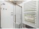 Modern bathroom with a glass-enclosed shower featuring white subway tiles, a built-in niche, and a rainfall showerhead at 2932 Old Drake Dr, Seabrook Island, SC 29455