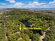 Stunning aerial view of a lush property near the water at 2932 Old Drake with beautiful trees at 2932 Old Drake Dr, Seabrook Island, SC 29455
