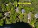 Aerial view of a home at 2932 Old Drake surrounded by lush greenery and close to a lake at 2932 Old Drake Dr, Seabrook Island, SC 29455