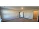 Spacious main bedroom featuring neutral carpet and a large closet for ample storage space at 306 Blue Haw Dr, Moncks Corner, SC 29461