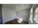 Versatile room with natural light and wood-look flooring, perfect for a home office or guest room at 306 Blue Haw Dr, Moncks Corner, SC 29461