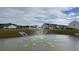 Scenic water feature in the Carolina Grove community with green space at 306 Blue Haw Dr, Moncks Corner, SC 29461