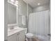 Clean bathroom with vanity sink, toilet, and shower featuring neutral finishes and hardware at 3713 Maidstone Dr, Mount Pleasant, SC 29466