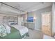 Stylish main bedroom features a four poster bed, shelving, and a flat screen television at 3713 Maidstone Dr, Mount Pleasant, SC 29466