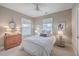 Cozy bedroom with a comfortable bed, dresser, side tables, and natural light from windows at 3713 Maidstone Dr, Mount Pleasant, SC 29466
