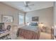 Comfortable bedroom featuring desk, neutral tones, and a ceiling fan for a relaxing ambiance at 3713 Maidstone Dr, Mount Pleasant, SC 29466