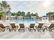 Beautiful community pool with lounge chairs and water features, great for recreation at 3713 Maidstone Dr, Mount Pleasant, SC 29466
