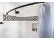 Updated shower with geometric tile accent, matte black fixtures, and convenient shower niche at 5110 Temple St, North Charleston, SC 29405
