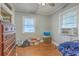 Cozy bedroom with hardwood floors, bright windows, and space for storage at 635 Sequoia St, Charleston, SC 29407