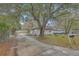 Charming home with a well-maintained driveway and mature trees, showcasing curb appeal at 635 Sequoia St, Charleston, SC 29407