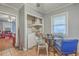 View of the kitchen's eat-in area, featuring tile flooring and an open storage closet at 635 Sequoia St, Charleston, SC 29407