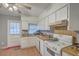 Functional kitchen featuring essential appliances and a door leading to the exterior at 635 Sequoia St, Charleston, SC 29407