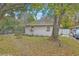 Side view of a cozy home, highlighting the architecture and surrounding greenery at 635 Sequoia St, Charleston, SC 29407