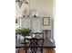 Formal dining room with seating for six and views of classic décor at 67 Legare St # 305, Charleston, SC 29401