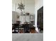 Formal dining room with seating for six and views of classic décor at 67 Legare St # 305, Charleston, SC 29401