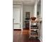 Hallway to the kitchen and refrigerator with room for decor at 67 Legare St # 305, Charleston, SC 29401