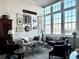 Bright living room with large windows and lots of natural light at 67 Legare St # 305, Charleston, SC 29401